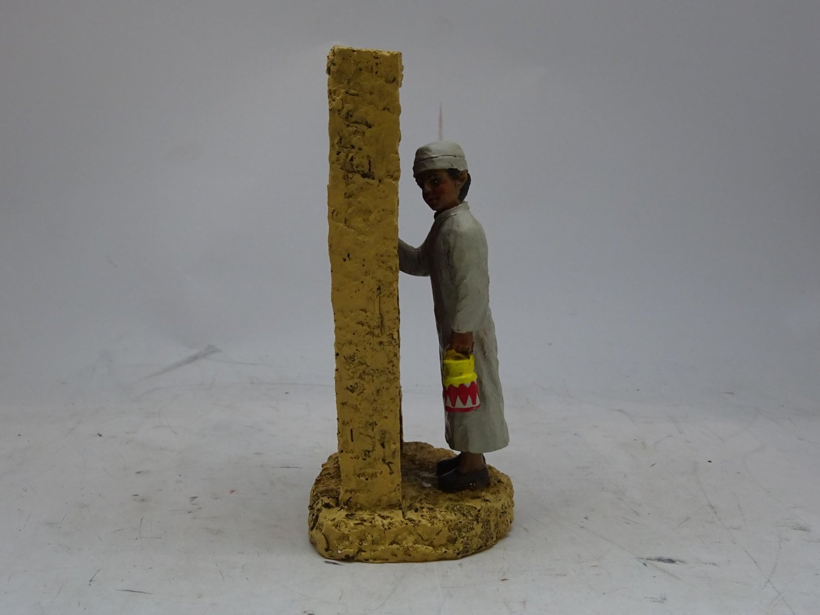 مجسم بائع اللبن والحليب